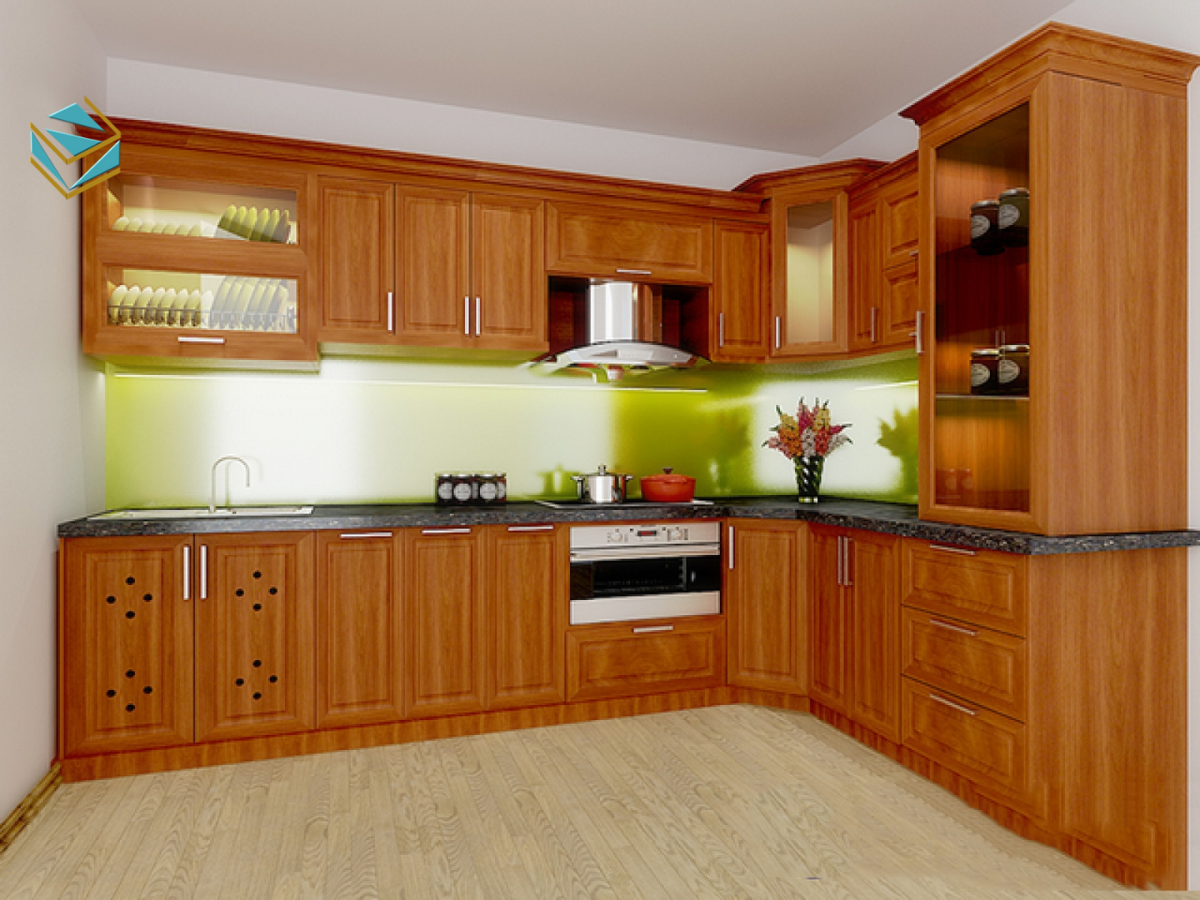 Mẫu tủ bếp gỗ xoan đào được bố trí hợp lý, tối ưu công năng và hợp phong thủy, giúp không gian bếp hài hòa, ấm cúng.