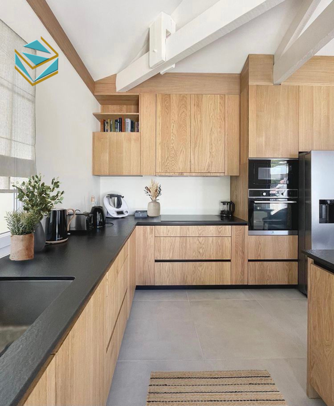 Mẫu thiết kế bếp mở với quầy đảo giúp kết nối không gian nấu ăn và khu vực sinh hoạt, tạo điểm nhấn hiện đại cho căn nhà.