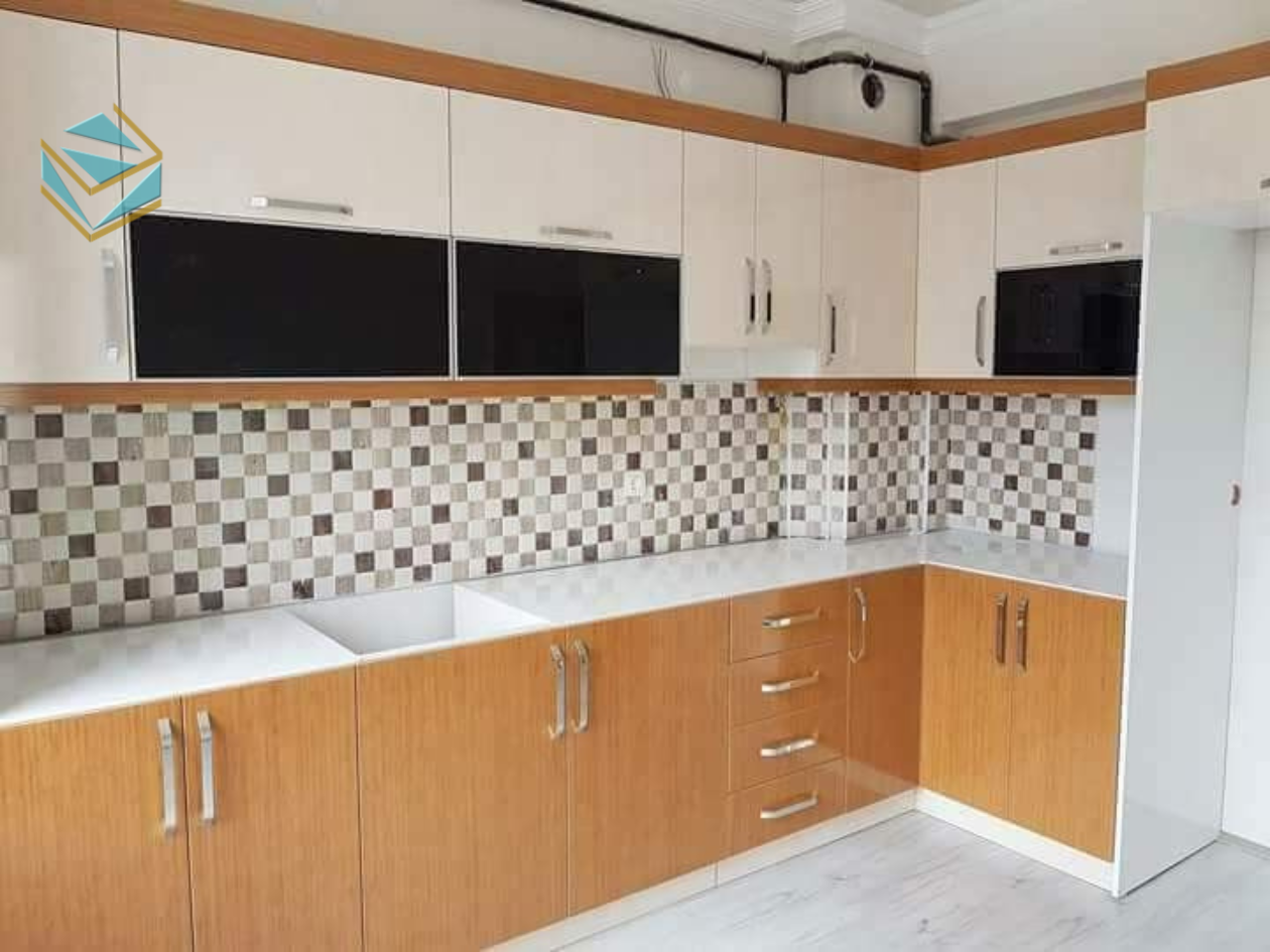 Dạng tủ bếp chữ L giúp tạo luồng di chuyển linh hoạt, thuận tiện cho việc nấu nướng hàng ngày.