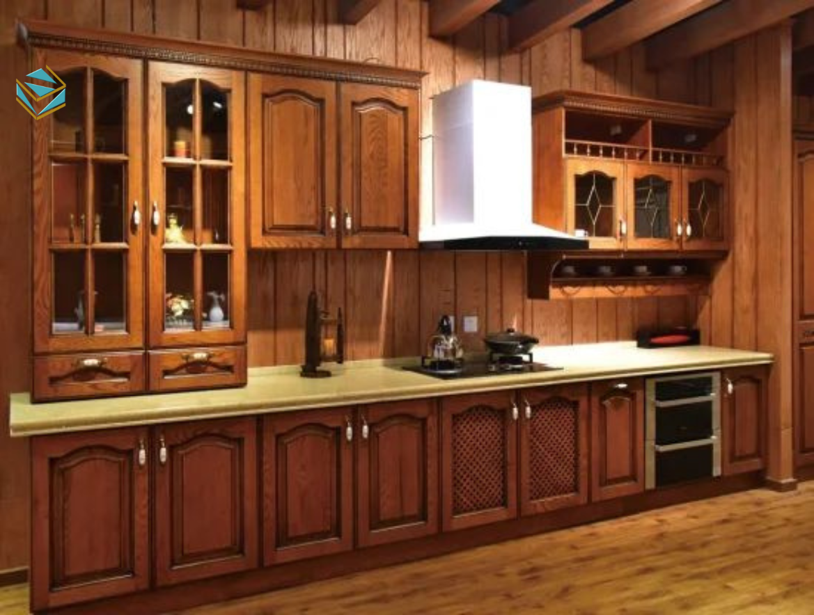 Gỗ óc chó tự nhiên với màu nâu đậm và vân gỗ hút mắt mang lại sự ấm áp và quyền quý cho phòng bếp.