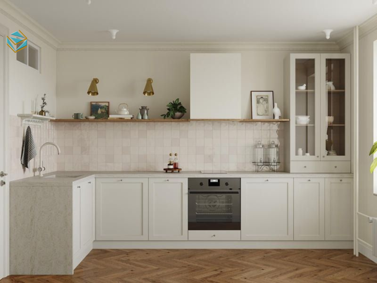 Hình ảnh tủ bếp nhỏ gọn màu trắng kết hợp mặt đá sáng, bố trí sát tường giúp tiết kiệm diện tích và tăng tính thẩm mỹ cho căn hộ studio.